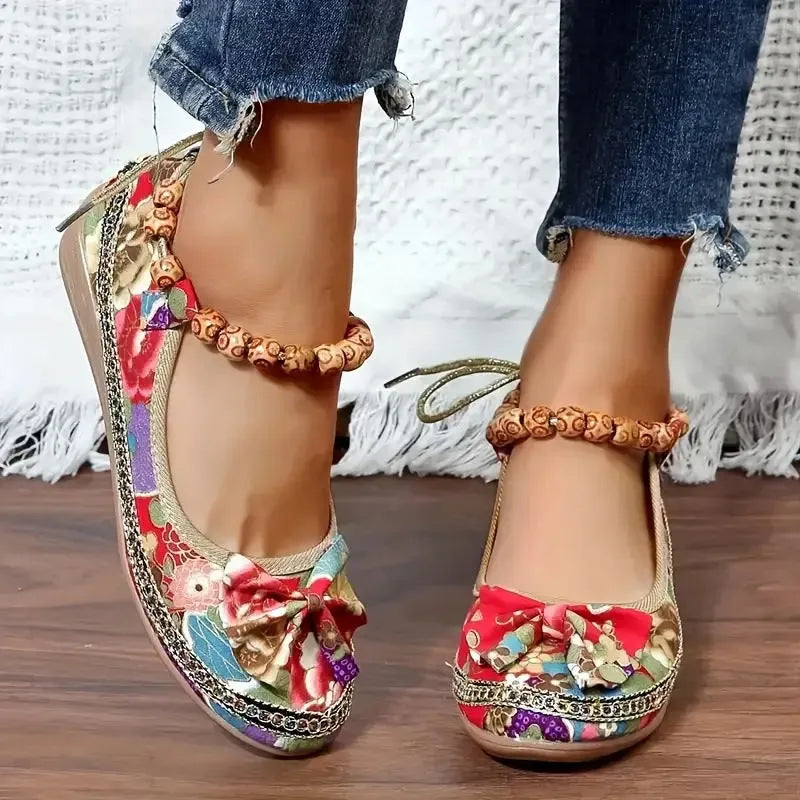 Women's plus size black ethnic platform sandals with elastic band and round toe on a PU sole.