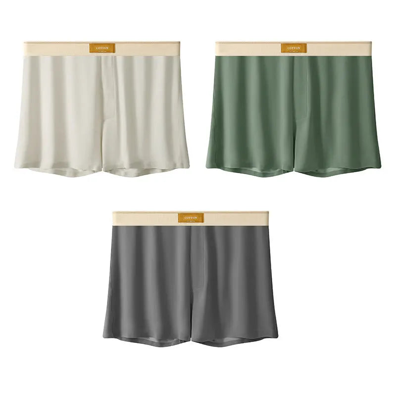 Men's loose fit ice silk underwear in solid colours showing mid-waist design and breathable fabric texture.