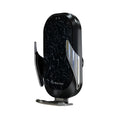 Black 15W smart car phone holder with wireless charging and infrared sensor on car dashboard