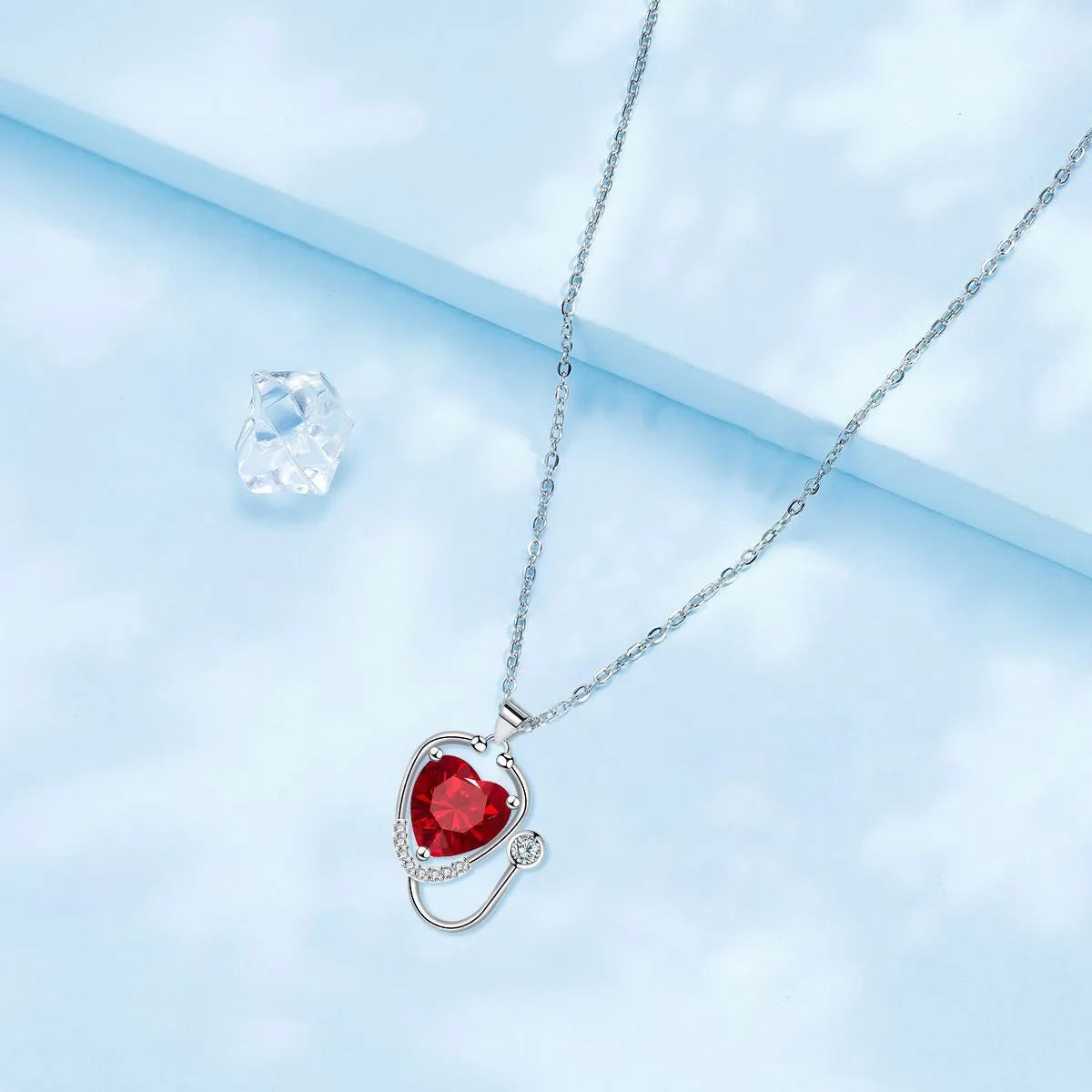 Women's stethoscope necklace with red diamond electroplated finish on copper chain