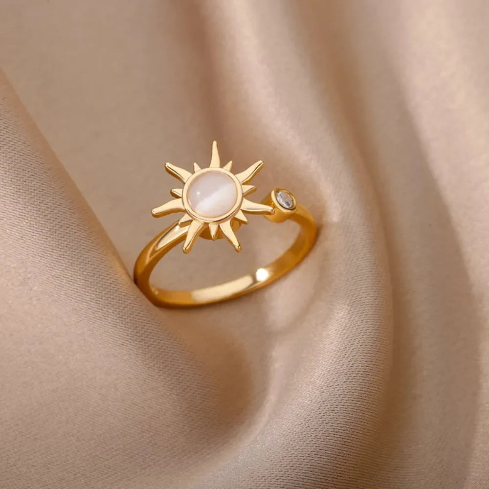 Copper rotatable decompression ring with adjustable opening in gold electroplated finish