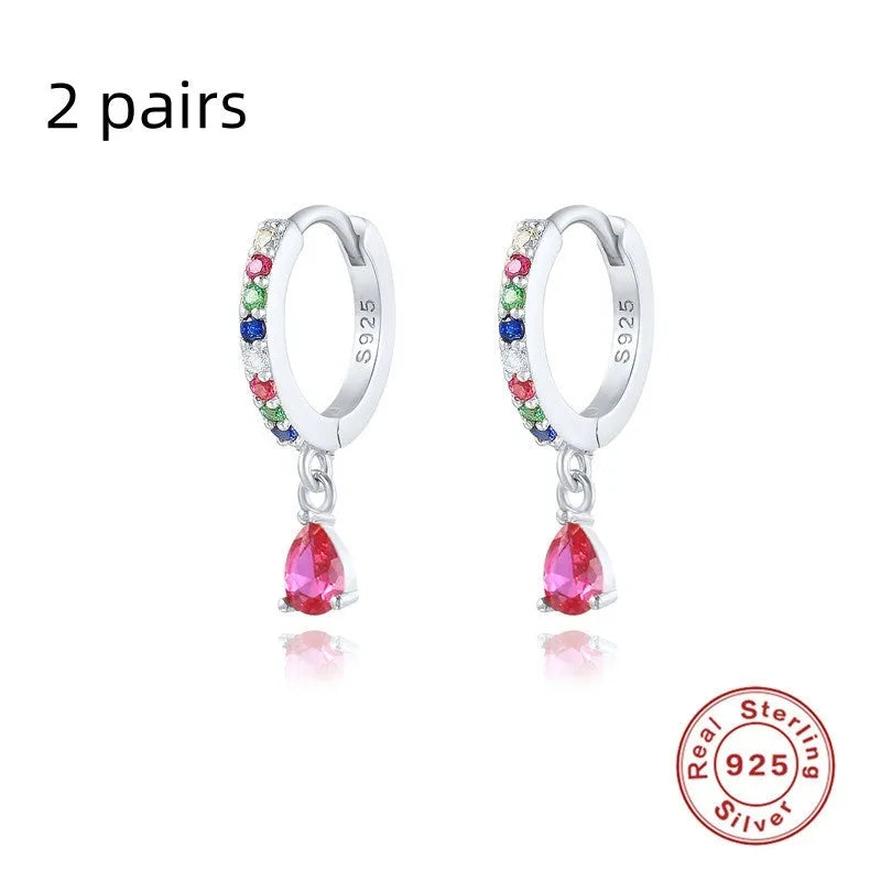 Geometric water drop earrings in Sterling Silver with electroplated gold finish and purple diamond stones