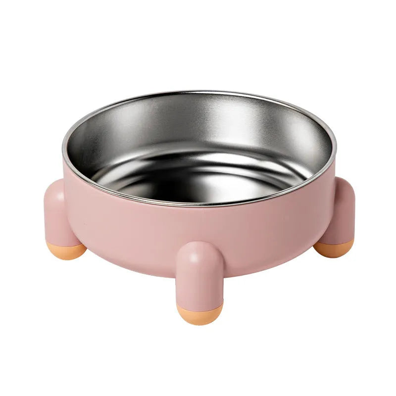 Green stainless steel pet bowl with non-slip base and high foot design on a wooden floor