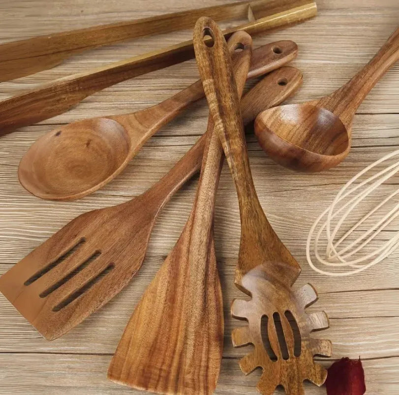 Seven-piece wooden cooking utensil set with spoon and shovel designs for non-stick pans