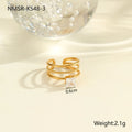 Gold-plated geometric stainless steel ring with inlaid zircon stones on a white background.