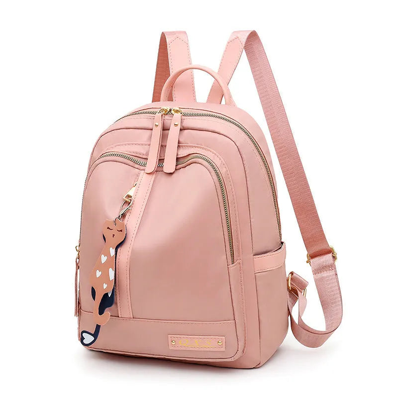Soft nylon casual backpack in black or pink with three-dimensional pockets and double shoulder straps