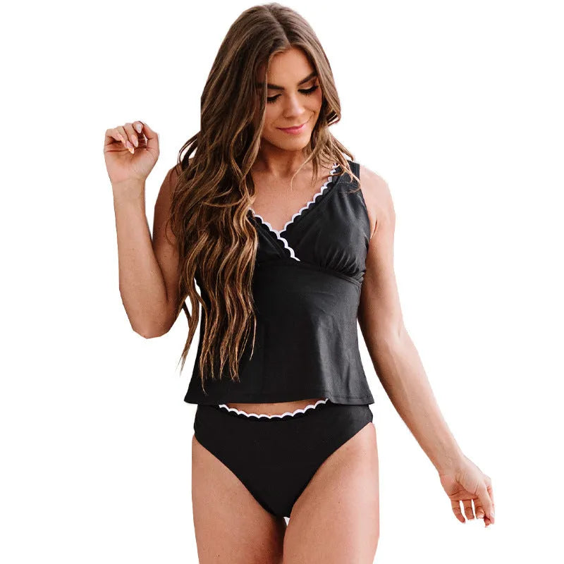 Black women's one-piece split swimsuit or bikini set made from nylon fabric.