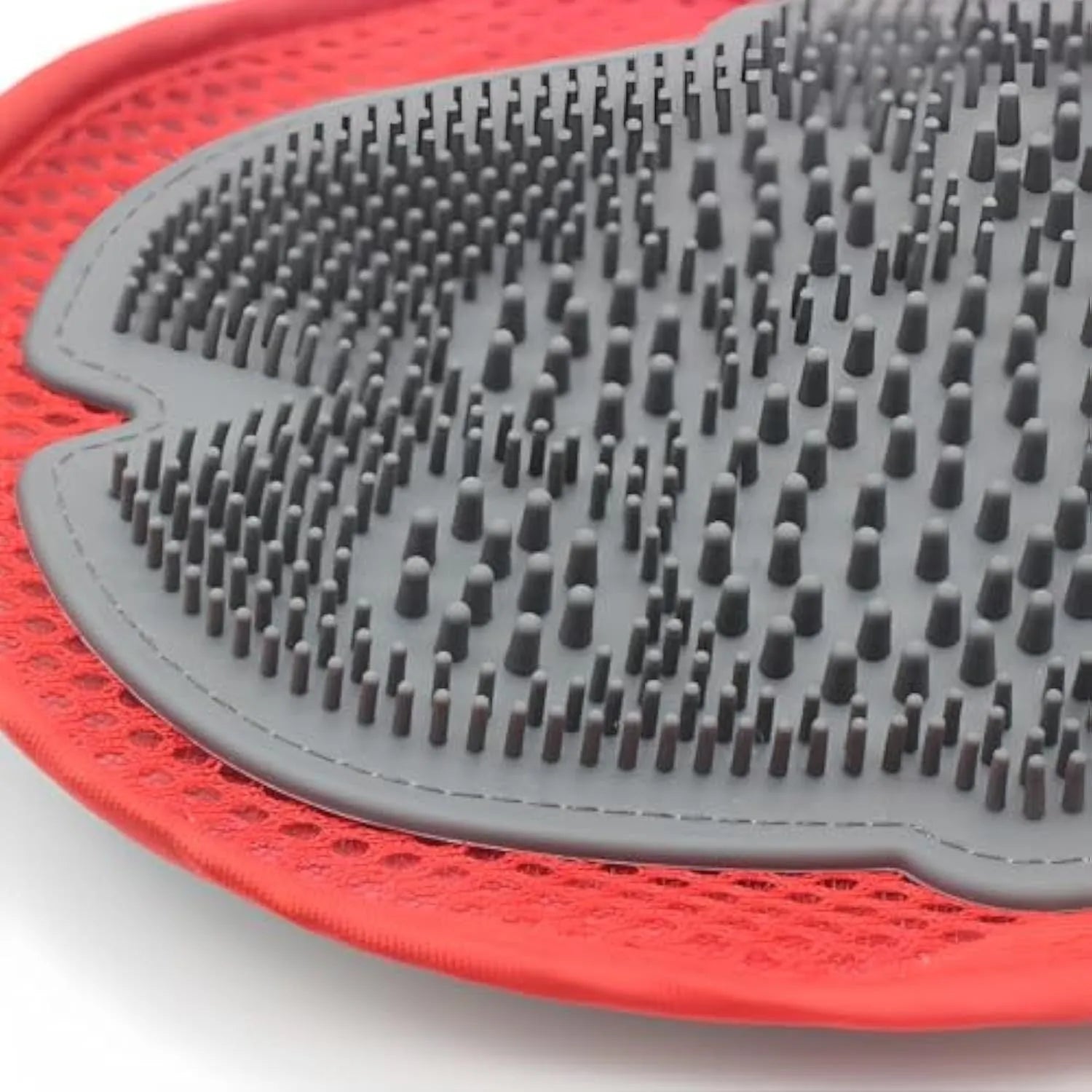 Red pet bathing glove with integrated brush for grooming and hair removal