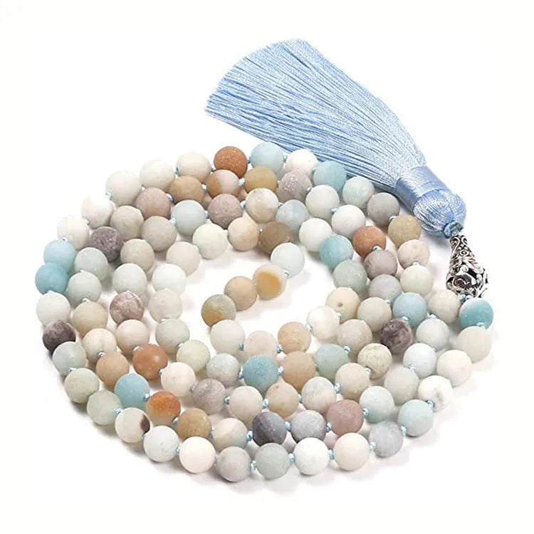 Long geometric agate necklace with tassel pendant in natural stone colours on a 95-100cm chain.