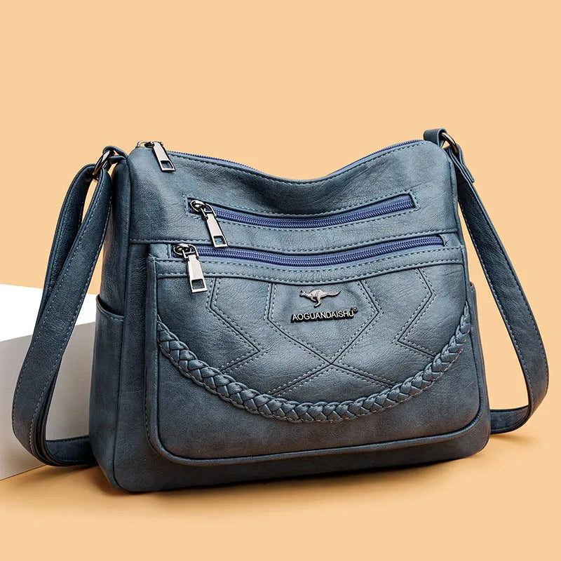 Soft PU leather shoulder bag in horizontal square shape with large capacity and zippered compartments