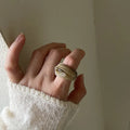 Chinese style irregular geometric resin ring in brown tones