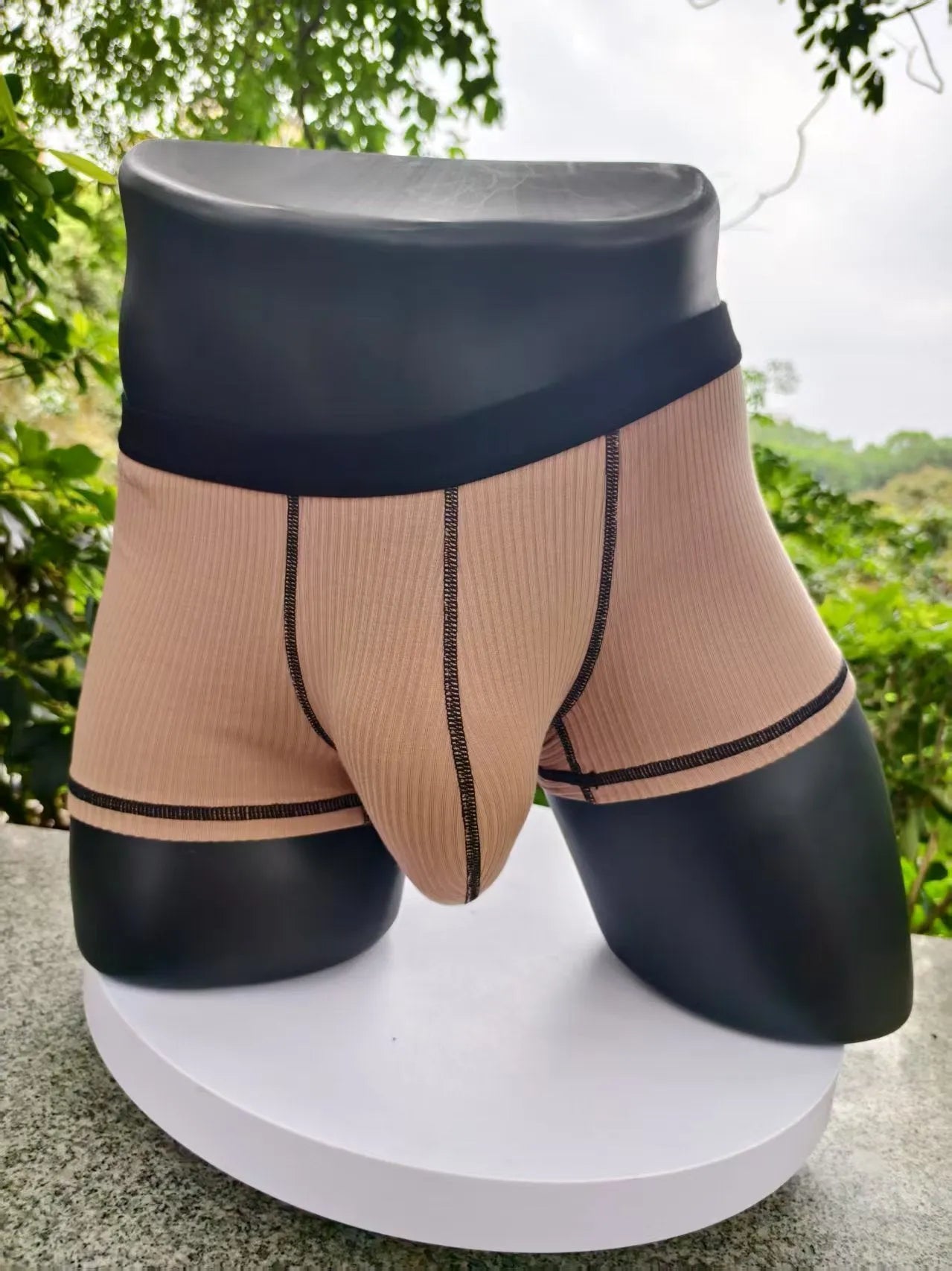 Men's slim-fit breathable boxer shorts in solid colours, shown in size range L to 3XL.