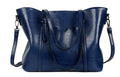 Retro messenger bag for women in multiple colours showing large main compartment and shoulder strap