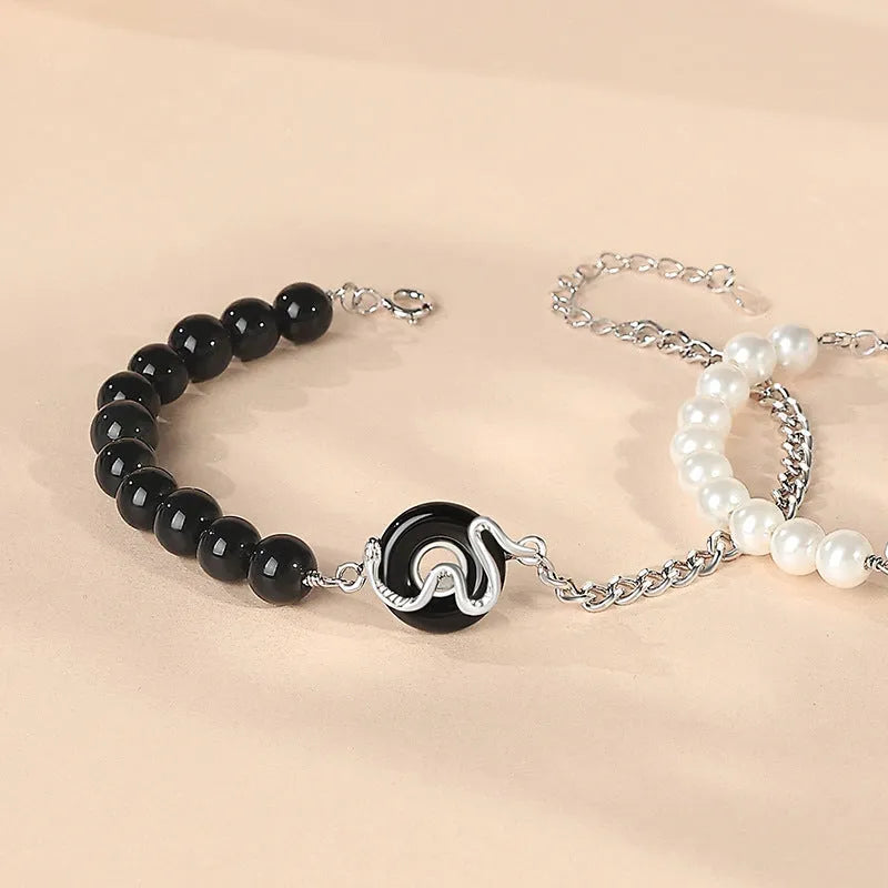 925 sterling silver couple bracelet with Chinese zodiac snake design and obsidian pearls