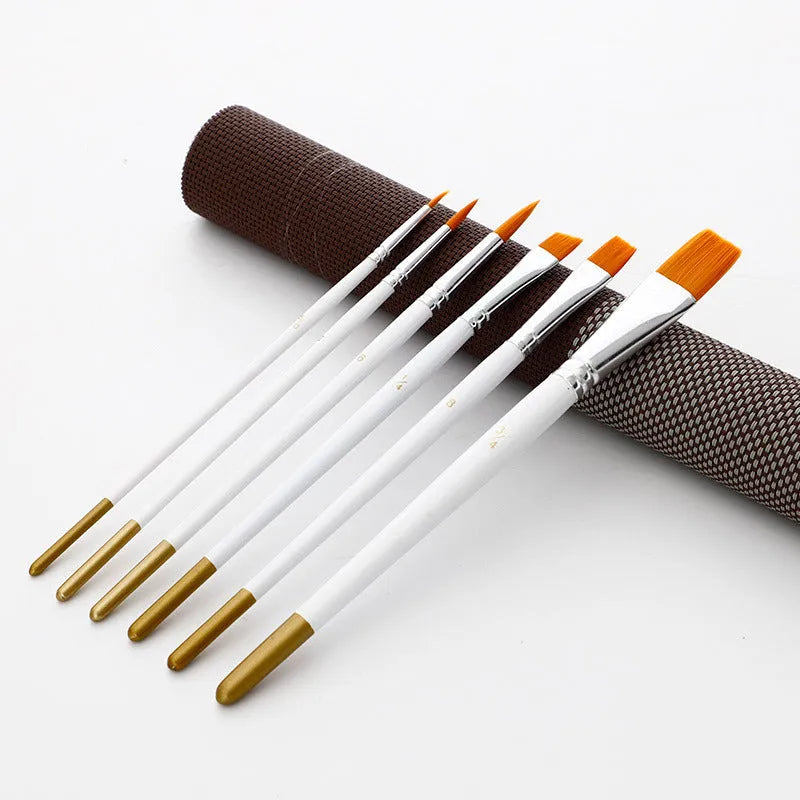 Set of six artist paint brushes with wood handles and synthetic nylon hair on a white background.
