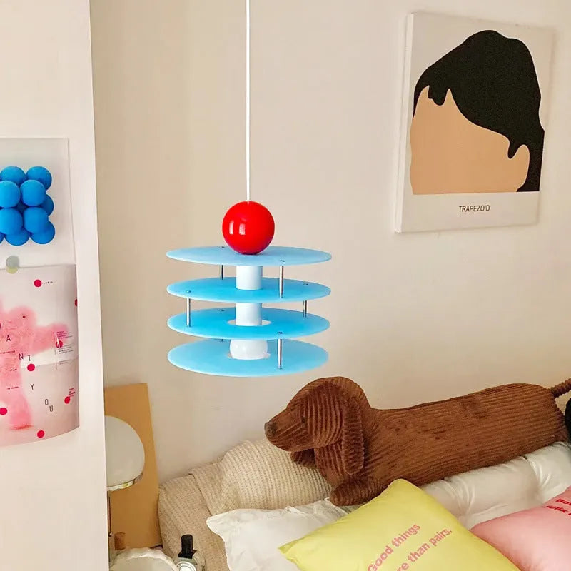 Personalised Macaron PH5 adjustable chandelier with frosted shade in restaurant setting