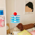 Personalised Macaron PH5 adjustable chandelier with frosted shade in restaurant setting