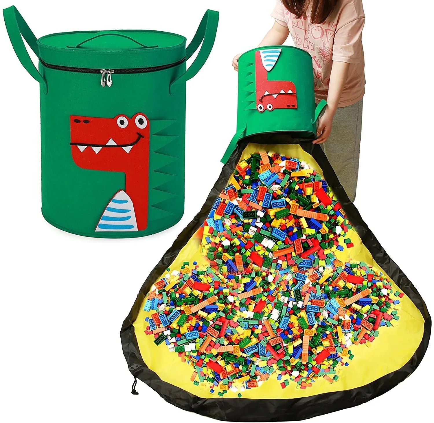 Green cube-shaped felt storage bag with pull rope lying flat as a play mat.