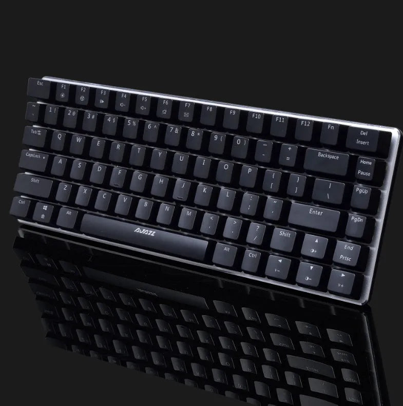 Black AK33RGB wired mechanical gaming keyboard with 82 keys and seven-colour backlight on a desk