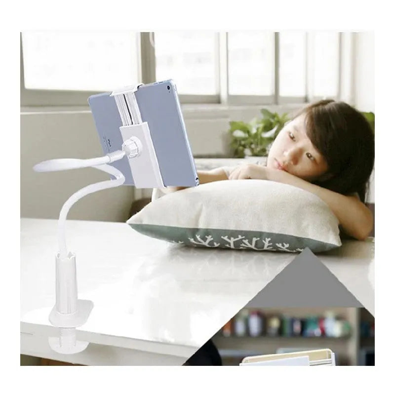 Flexible black phone and tablet mount holder with suction base and adjustable arm on a kitchen counter.