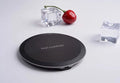 Ultra-thin wireless charger pad in black with LED indicator light and USB cable