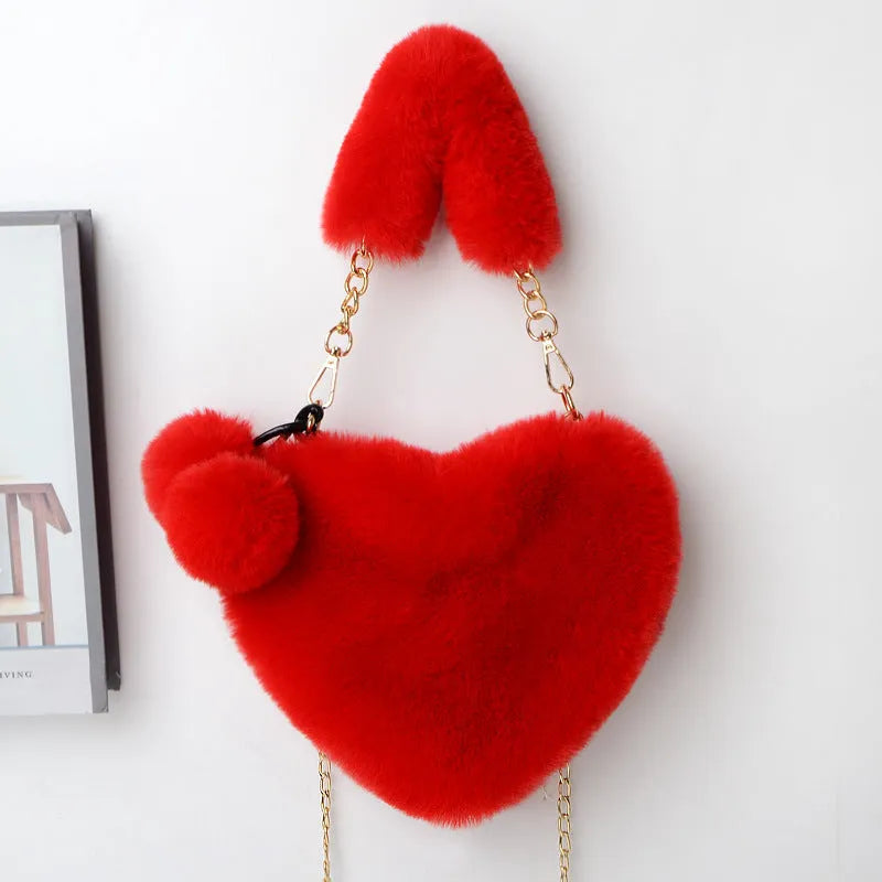 Heart-shaped women's plush handbag with soft texture and detachable shoulder strap in medium size