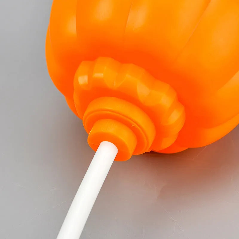 Plastic pumpkin lamp with USB cable for seasonal decoration in yellow or purple light