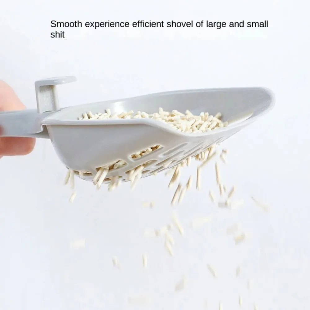 Grey plastic cat litter scoop with cleaning comb and separate storage base