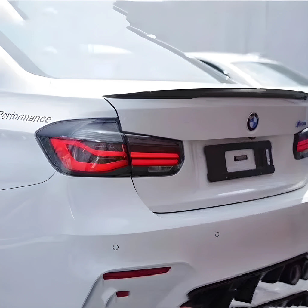 BMW 3 Series tail light assembly with LED streamer running lights in red or smoked black colour