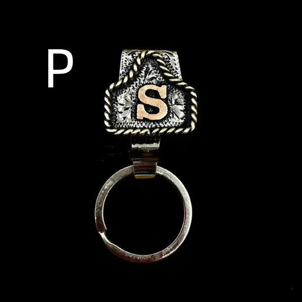 Handmade metal cow tag belt key holder with personalised alphabet letter