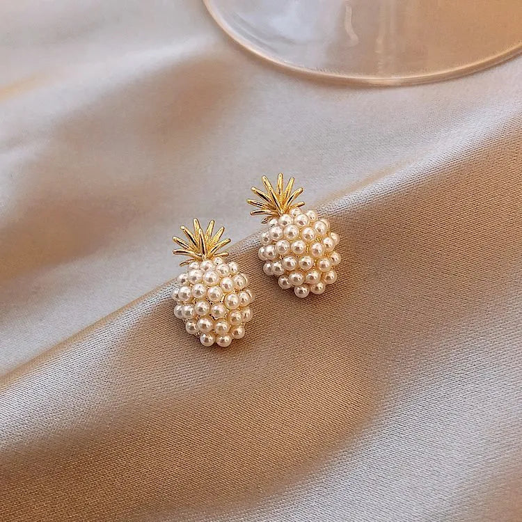 Korean-style women's drop earrings with a pineapple starfish pearl design in alloy with stone inlay.