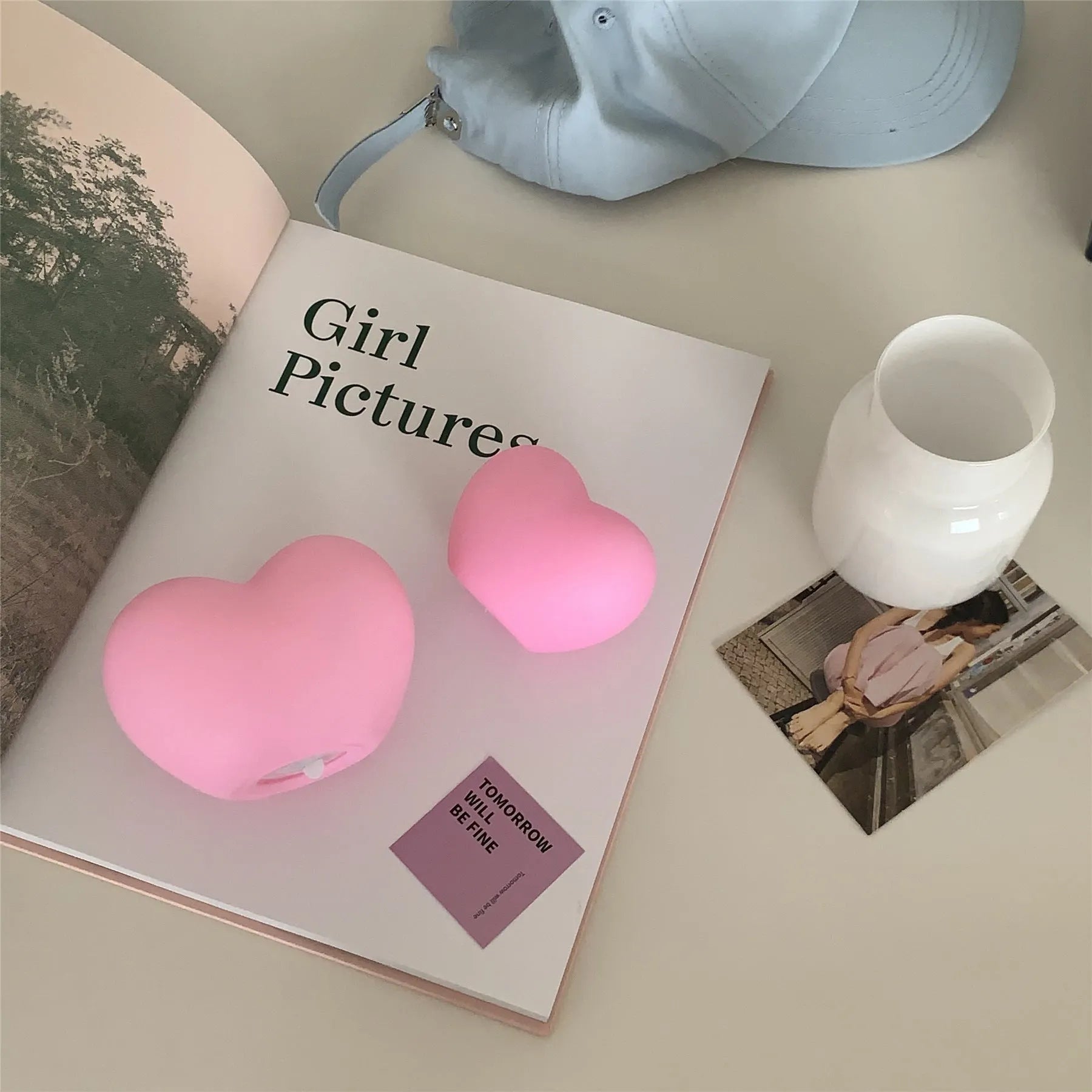 White or pink vinyl atmosphere lamp in trumpet or tuba design with warm glowing light