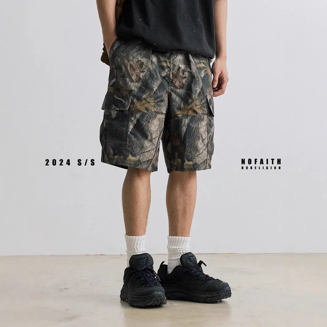 Loose straight-leg denim shorts in black with micro-elastic waistband and zip fly opening
