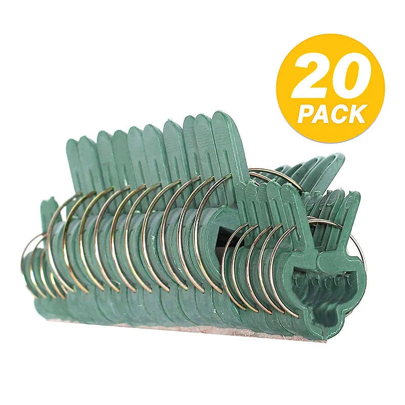 Green plastic and zinc plant fixing clips, large and small sizes, for training climbing vines and tomatoes.