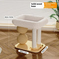 A solid pine wood cat nest with a grasping ball, shown in three style variants.