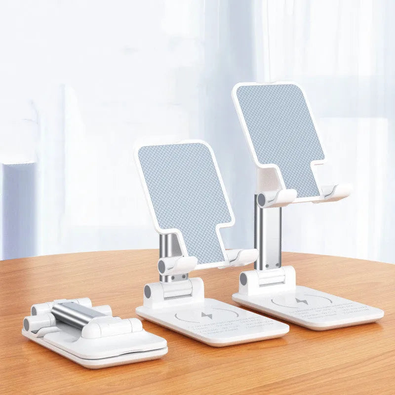 Black wireless charging phone desk stand holding a mobile phone at an angle.