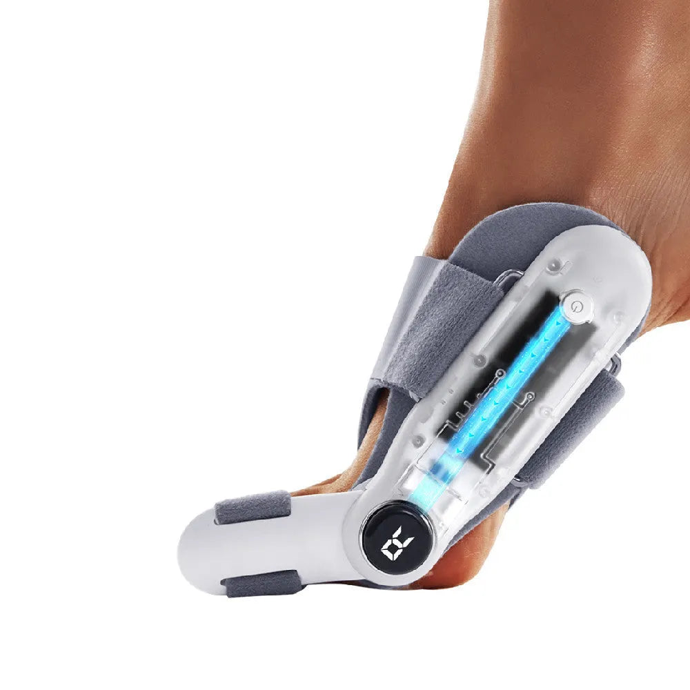 White plastic electric hallux valgus toe separator with Type-C charging cable