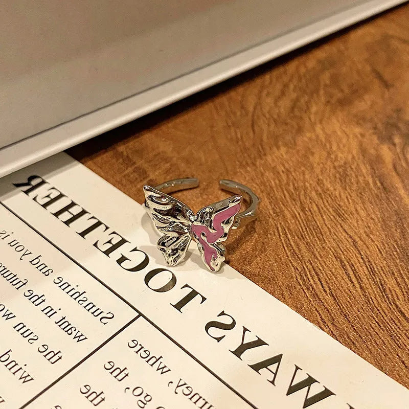 Copper Chinese butterfly women's ring showing creative design with oil dripping treatment finish