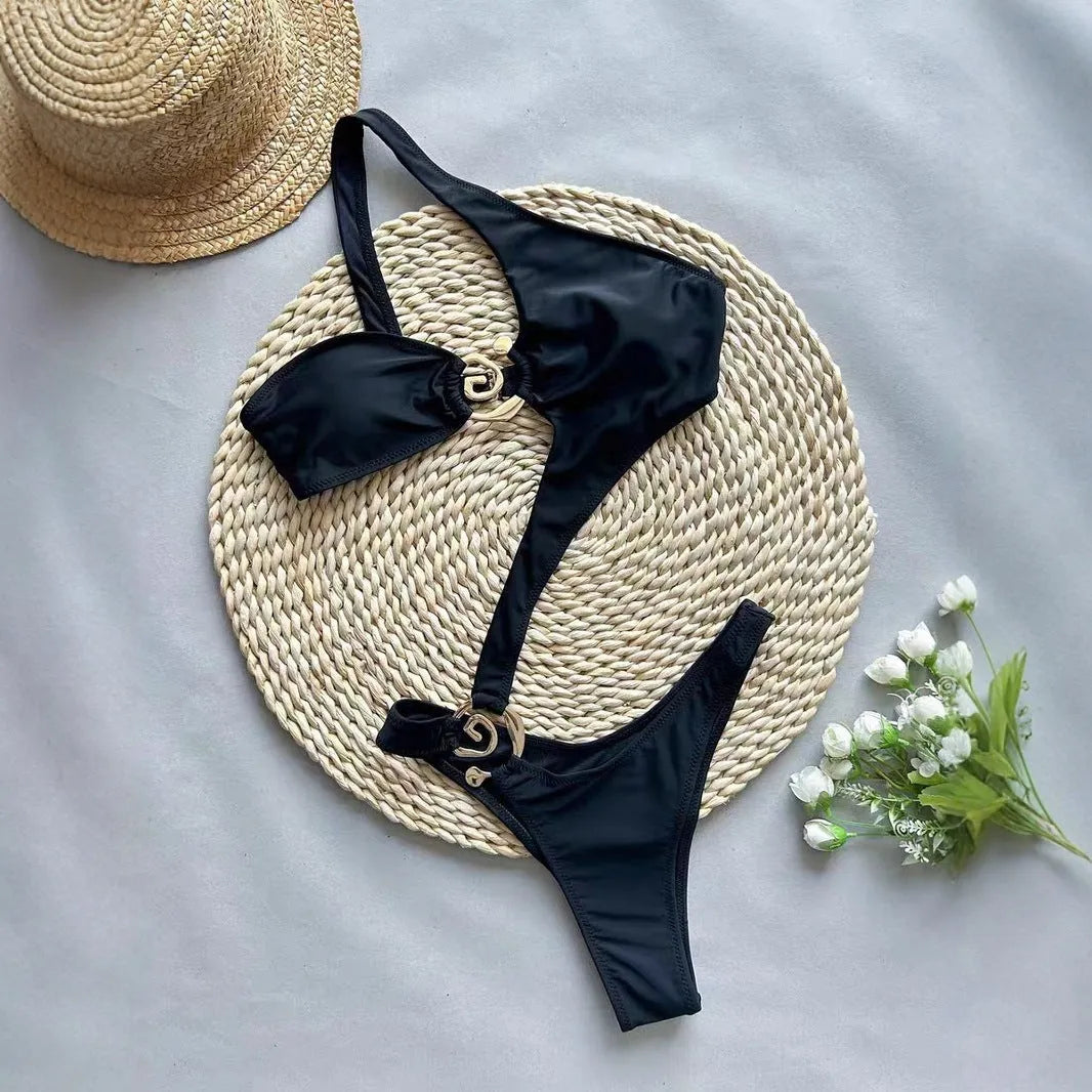 Women's black nylon printed bikini swimsuit set, front view, showing top and bottom pieces