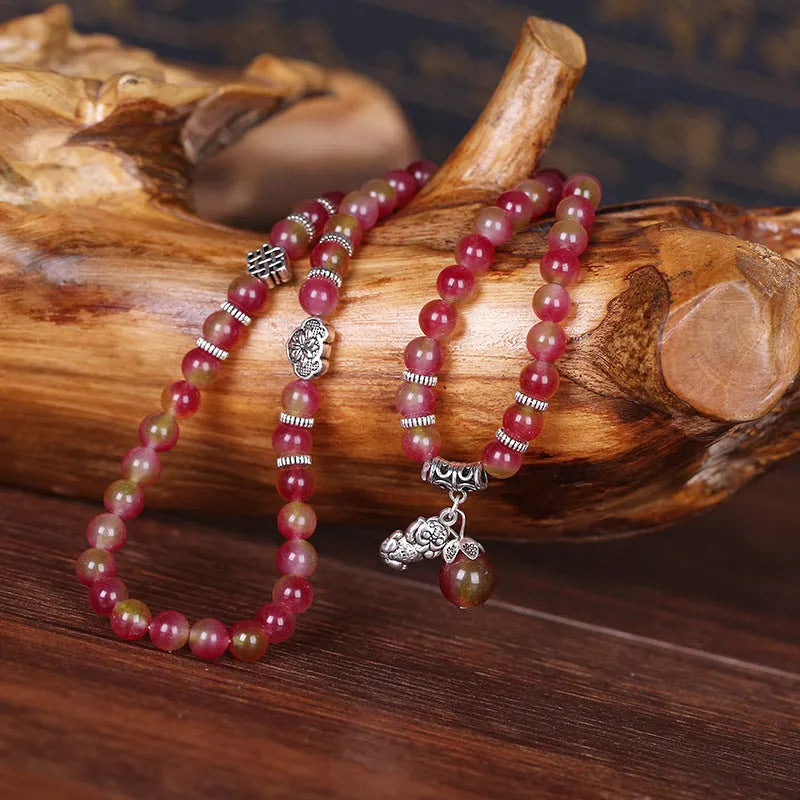 Handmade natural watermelon crystal bracelet with Chinese knot closure in geometric national style design