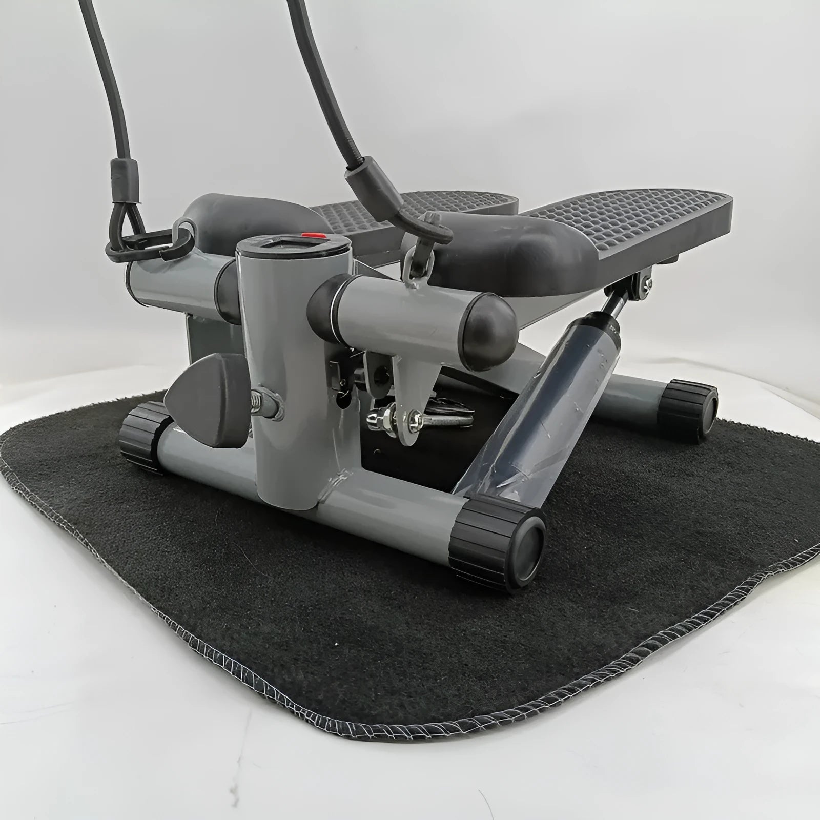 Silver grey hydraulic pedal exerciser for home and gym waist slimming workouts
