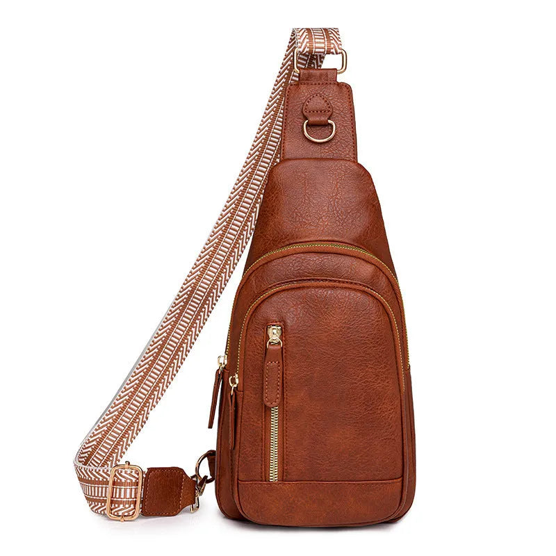 Soft brown women's crossbody chest bag showing zip compartments and street-style sewing thread detail