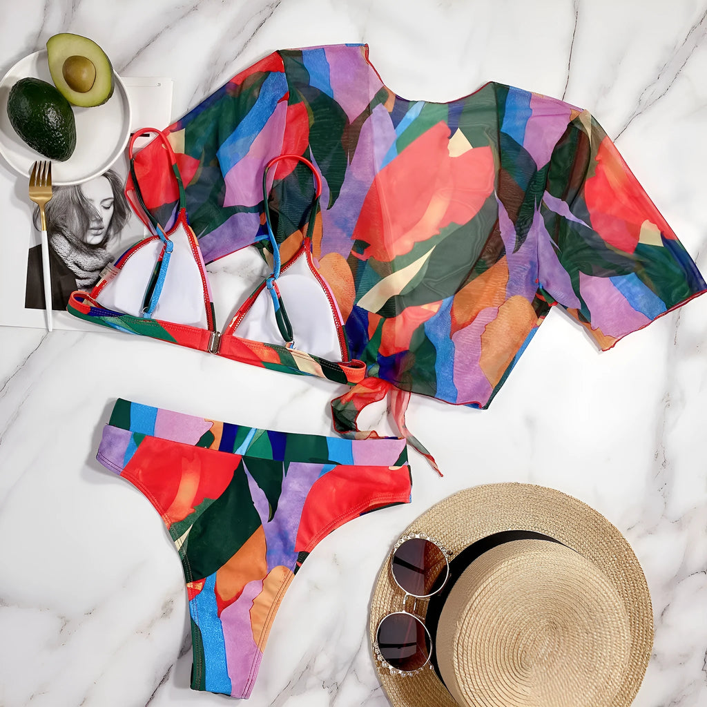 Red women's split swimsuit with printed design for swimming and surfing activities