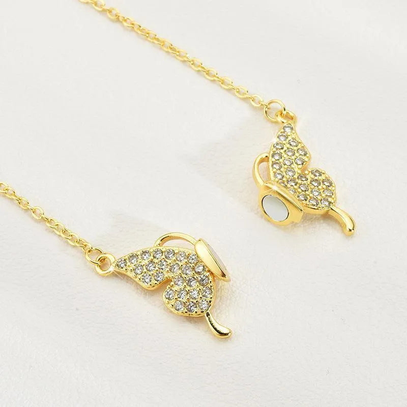 Women's magnetic snap butterfly pendant necklace with twisted titanium steel chain in gold colour