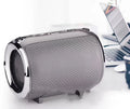 Portable plug-in subwoofer sound system in a metal shell showing button controls and available in five colours.