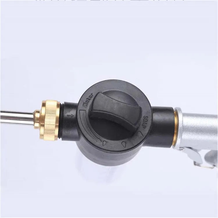Gold high-pressure car wash water gun with copper head and aluminium alloy handle on a white background