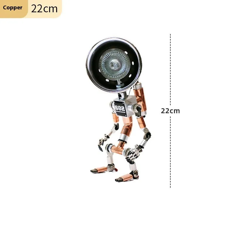 Silver copper robot-shaped atmosphere light with graphic customisation on a desk.