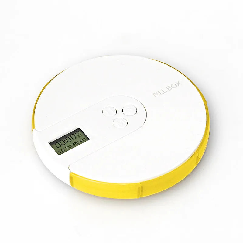 Blue 7-compartment electronic alarm clock pill dispenser showing timer display and storage sections.