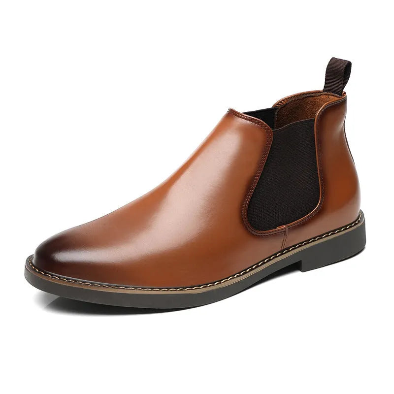 Men's black formal pointed-toe leather boots with a square heel and rubber sole on a plain background.