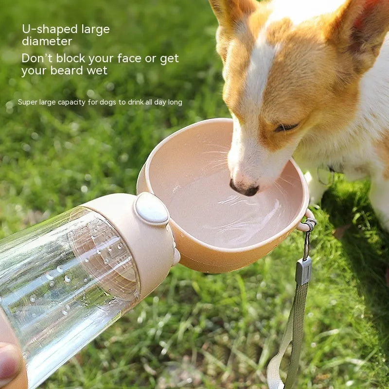 Portable plastic dog water bottle with attached feeding bowl in yellow colour